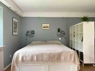 Ein Bett oder Betten in einem Zimmer der Unterkunft Mitten in Nastätten und doch im Grünen: schönes und modernes Apartment