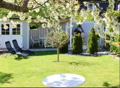 Ein Garten an der Unterkunft Charmante Ferienwohnung in Mastershausen/Hunsrück