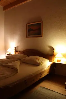 Ein Bett oder Betten in einem Zimmer der Unterkunft Weingut -1869- Brunnenhof