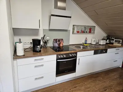Küche/Küchenzeile in der Unterkunft Am Lindenbaum, Ferienwohnung in Siebenbach am Nürburgring
