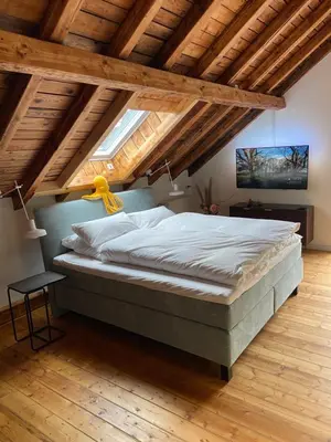 Ein Bett oder Betten in einem Zimmer der Unterkunft Apartment Cochemer Kaffeerösterei