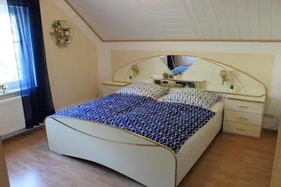 Ein Bett oder Betten in einem Zimmer der Unterkunft Studio Blick ins Tal