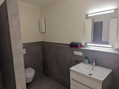 Ein Badezimmer in der Unterkunft Ferienwohnungen Heimkino Cochem