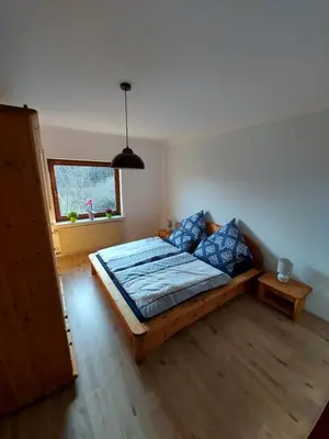 Ein Bett oder Betten in einem Zimmer der Unterkunft Ferienhaus Berghof Usch