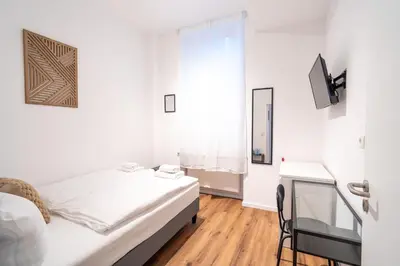 Ein Bett oder Betten in einem Zimmer der Unterkunft Honeybee Properties Ferienwohnungen Koblenz
