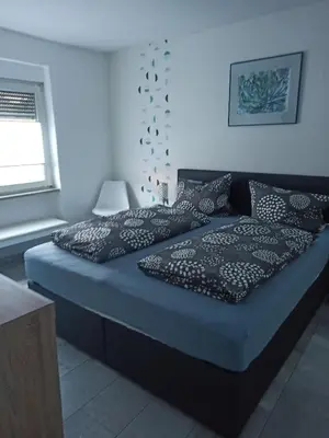 Ein Bett oder Betten in einem Zimmer der Unterkunft Ferienhaus Laila