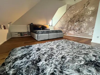 Ein Bett oder Betten in einem Zimmer der Unterkunft Trierer Heide - Architektur zum wohl fühlen