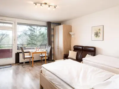 Ein Bett oder Betten in einem Zimmer der Unterkunft Apartment Flora und Fauna - B306-B307 by Interhome