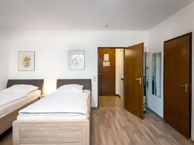 Ein Bett oder Betten in einem Zimmer der Unterkunft Apartment Flora und Fauna - B306-B307 by Interhome