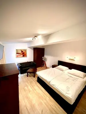 Ein Bett oder Betten in einem Zimmer der Unterkunft Hotel zur Römerbrücke