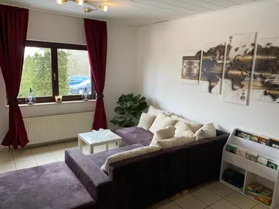Ein Sitzbereich in der Unterkunft Gemütliche Ferienwohnung auf dem Land