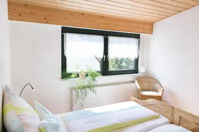 Ein Bett oder Betten in einem Zimmer der Unterkunft Ferienwohnung Am Breyer Talbach