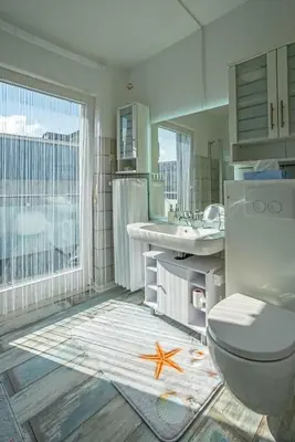 Ein Badezimmer in der Unterkunft Park Hotel