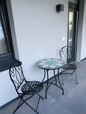 Ein Balkon oder eine Terrasse in der Unterkunft BG Living & Hosting - Stylish Luxury Apartments in the City Center - Parking, WiFi & Washing Machine