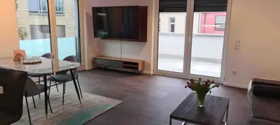 TV/Unterhaltungsangebot in der Unterkunft BG Living & Hosting - Stylish Luxury Apartments in the City Center - Parking, WiFi & Washing Machine