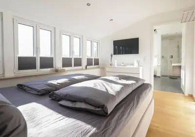 Ein Bett oder Betten in einem Zimmer der Unterkunft Residenz Kirchberg