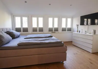 Ein Bett oder Betten in einem Zimmer der Unterkunft Residenz Kirchberg