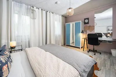 Ein Bett oder Betten in einem Zimmer der Unterkunft Charmante Privatzimmer in der Stadt