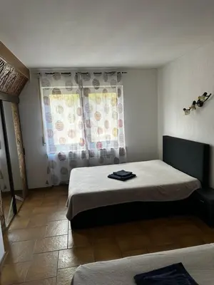 Ein Bett oder Betten in einem Zimmer der Unterkunft Haus am See