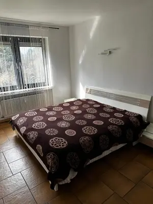 Ein Bett oder Betten in einem Zimmer der Unterkunft Haus am See