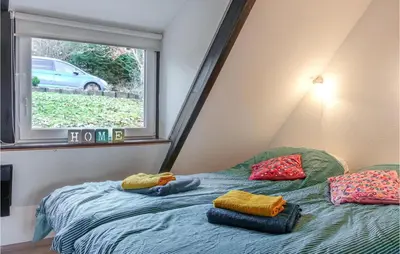 Ein Bett oder Betten in einem Zimmer der Unterkunft Ferienhaus Schöne Aussicht