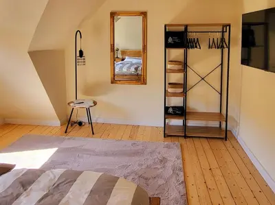 Ein Bett oder Betten in einem Zimmer der Unterkunft _Ferienhaus Leutesdorf Rheinzeit 614 schönes Haus direkt am Rhein