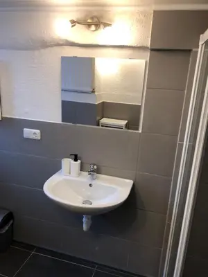 Ein Badezimmer in der Unterkunft Ferienhaus Herzblume