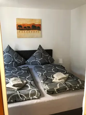 Ein Bett oder Betten in einem Zimmer der Unterkunft Ferienhaus Herzblume