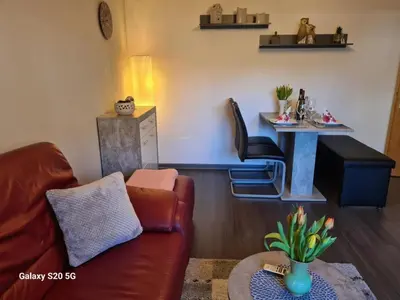 Ein Sitzbereich in der Unterkunft NEU! Ferienwohnung Eulennest