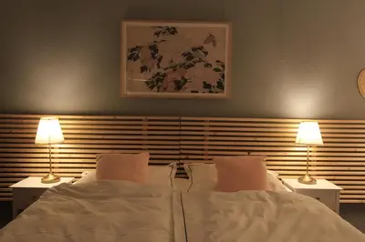 Ein Bett oder Betten in einem Zimmer der Unterkunft Zimmer AsiaDreieck Pension