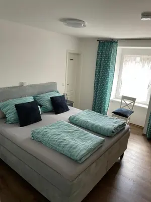 Ein Bett oder Betten in einem Zimmer der Unterkunft Ferienwohnung Traumzeit