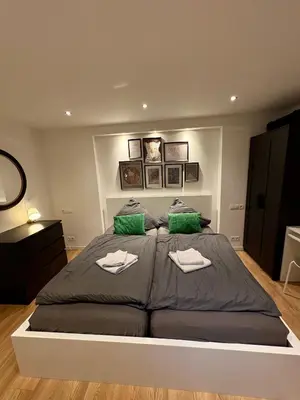Ein Bett oder Betten in einem Zimmer der Unterkunft Dein Haus am Rhein