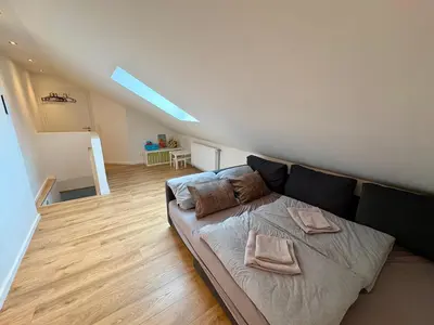 Ein Bett oder Betten in einem Zimmer der Unterkunft Dein Haus am Rhein
