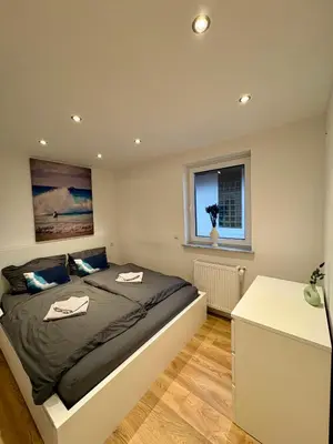 Ein Bett oder Betten in einem Zimmer der Unterkunft Dein Haus am Rhein