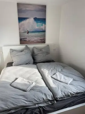 Ein Bett oder Betten in einem Zimmer der Unterkunft Dein Haus am Rhein