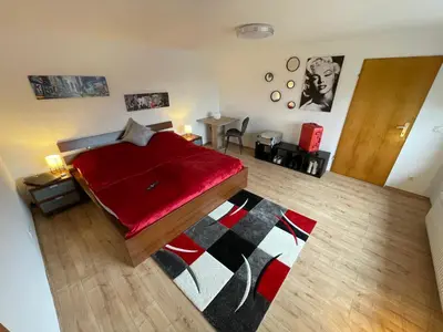 Ein Bett oder Betten in einem Zimmer der Unterkunft Ferienhaus Rheinnähe