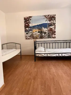 Ein Bett oder Betten in einem Zimmer der Unterkunft Ferien am Maar
