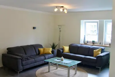Ein Sitzbereich in der Unterkunft Ferienwohnung Faber