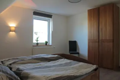 Ein Bett oder Betten in einem Zimmer der Unterkunft Ferienwohnung Faber