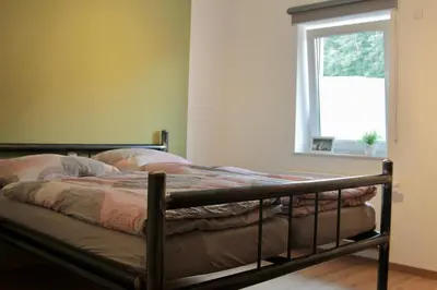 Ein Bett oder Betten in einem Zimmer der Unterkunft Ferienwohnung Faber