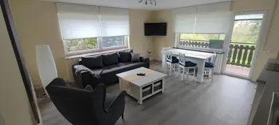 Ein Sitzbereich in der Unterkunft Ferienwohnung Räuberhöhle