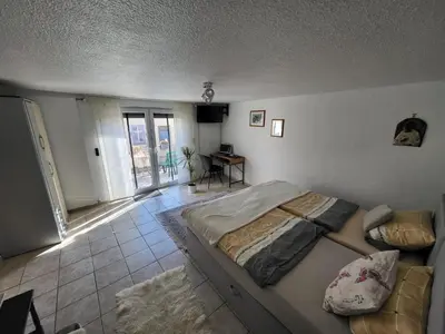 Ein Bett oder Betten in einem Zimmer der Unterkunft Ferienwohnung Haus Luzia
