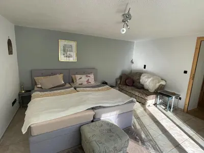 Ein Bett oder Betten in einem Zimmer der Unterkunft Ferienwohnung Haus Luzia