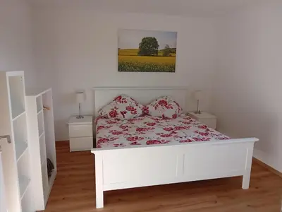 Ein Bett oder Betten in einem Zimmer der Unterkunft Ferienbauernhof Neumühle