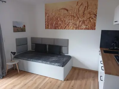 Ein Bett oder Betten in einem Zimmer der Unterkunft Ferienbauernhof Neumühle