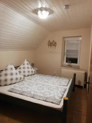 Ein Bett oder Betten in einem Zimmer der Unterkunft Haus Oldenburg