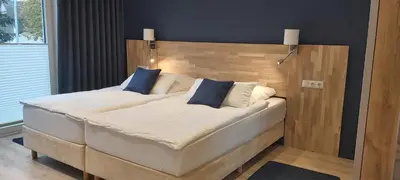 Ein Bett oder Betten in einem Zimmer der Unterkunft Maison Vulkanstein