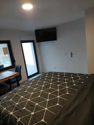 Ein Bett oder Betten in einem Zimmer der Unterkunft Das Herzchen von Ellenz