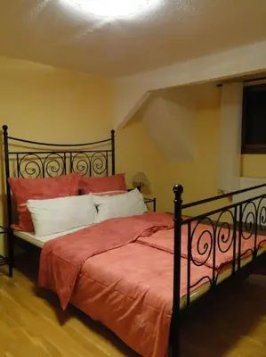 Ein Bett oder Betten in einem Zimmer der Unterkunft Kleine Residenz am Zehnthof