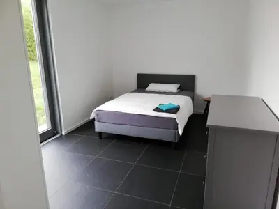 Ein Bett oder Betten in einem Zimmer der Unterkunft Villa